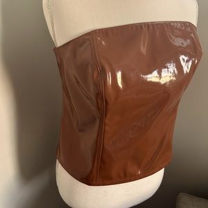 Anthropology NWT caramel brown strapless top with elastic back and side zipper.